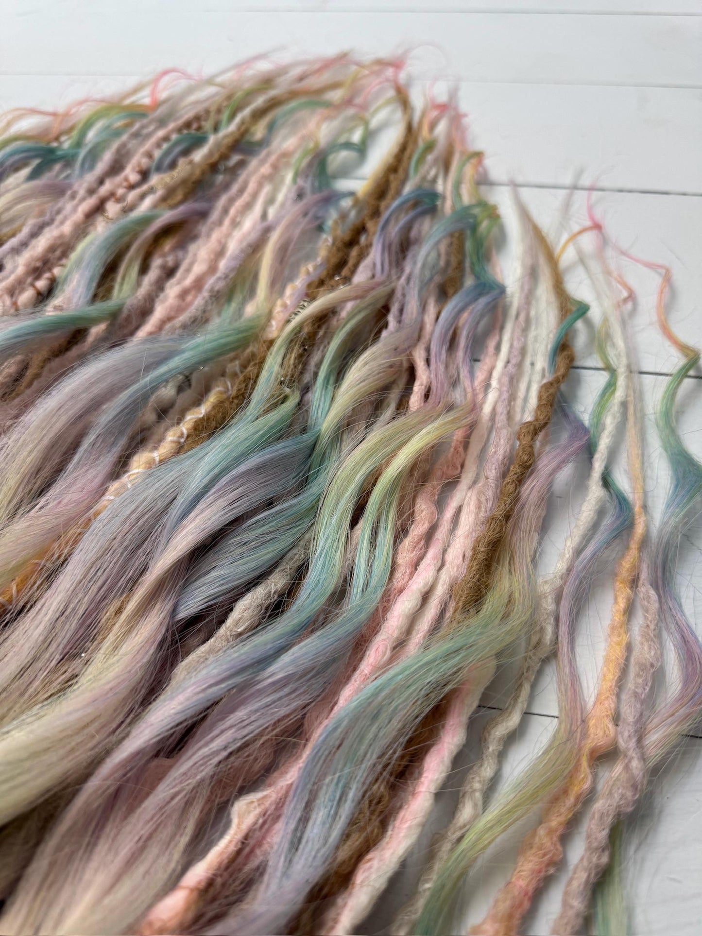 Pastel Rainbow Dreadlock Extensions with Braids, Curls, and Hair Charms