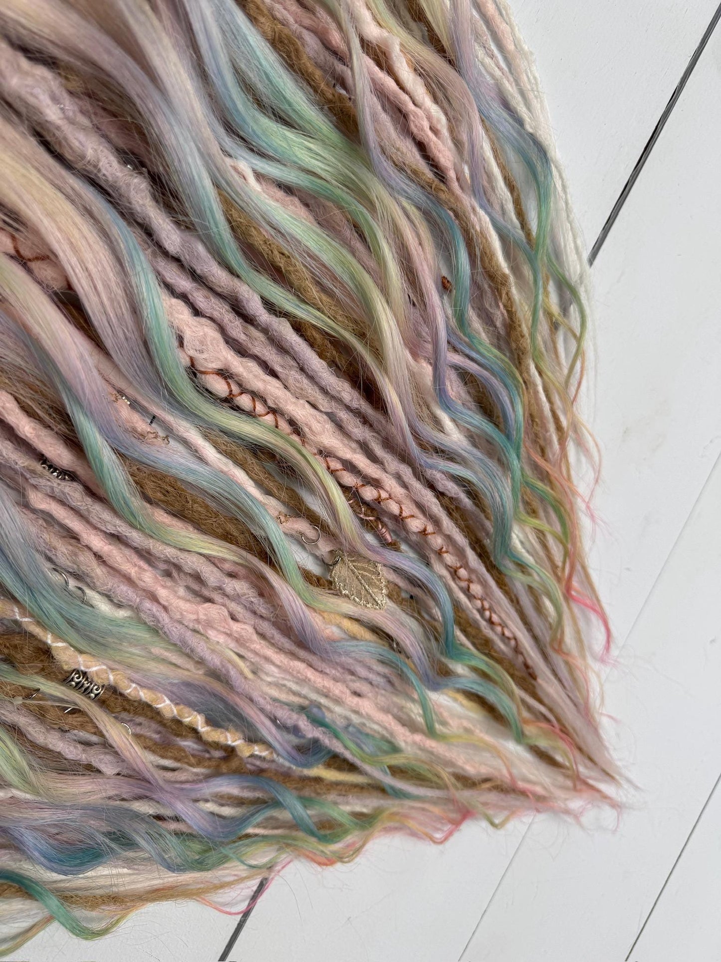 Pastel Rainbow Dreadlock Extensions with Braids, Curls, and Hair Charms