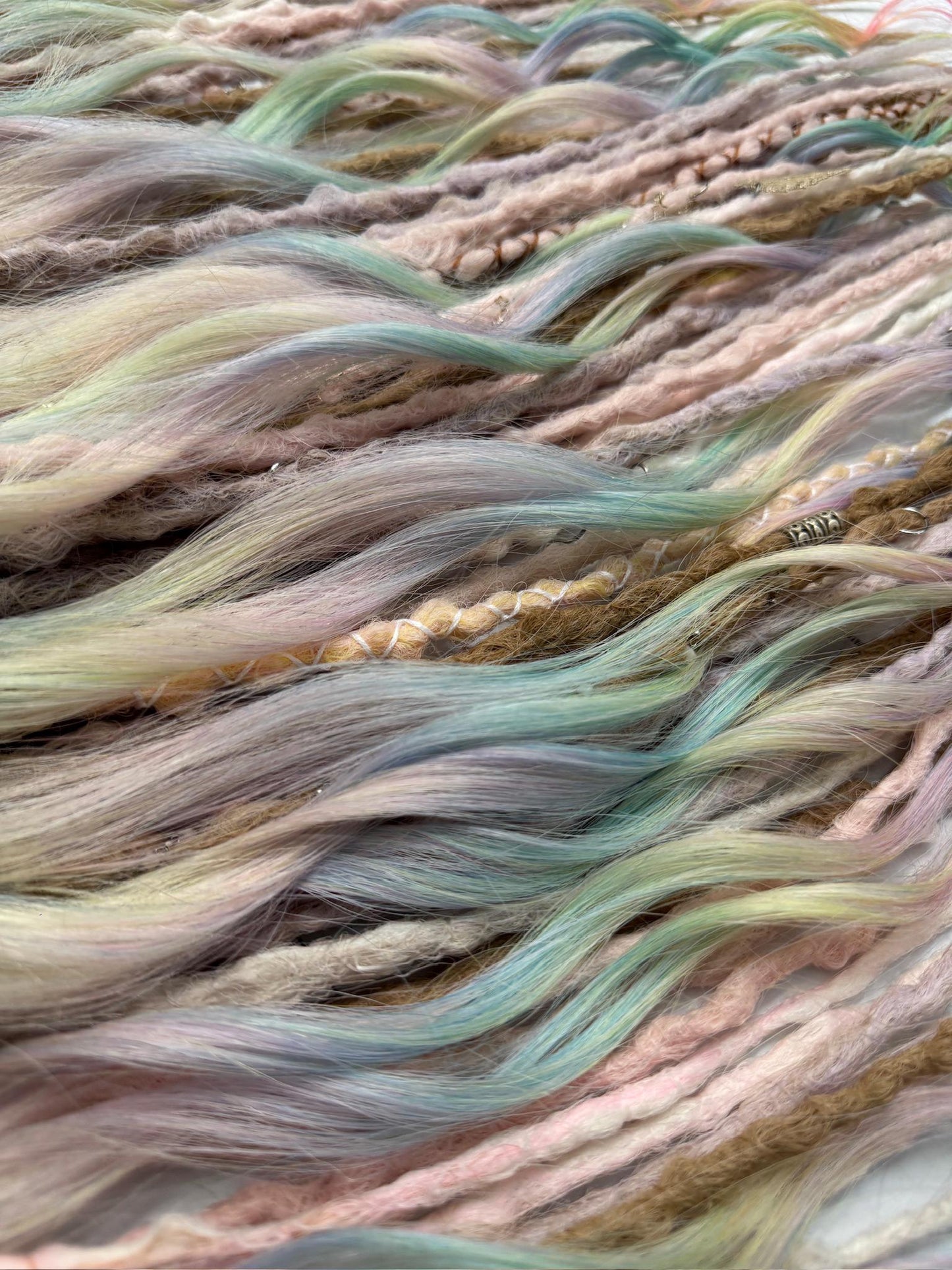 Pastel Rainbow Dreadlock Extensions with Braids, Curls, and Hair Charms