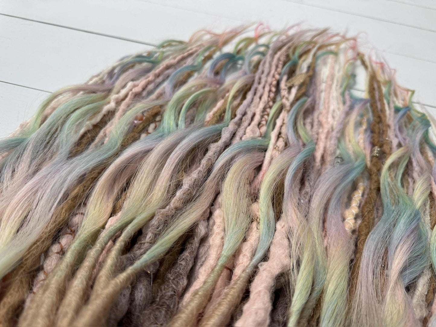 Pastel Rainbow Dreadlock Extensions with Braids, Curls, and Hair Charms